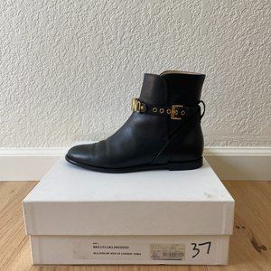 Moschino gold ankle strap booties